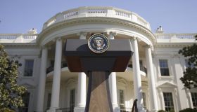 USA, Washington DC, Presidential Seal on podium in front of The White House, low angle view