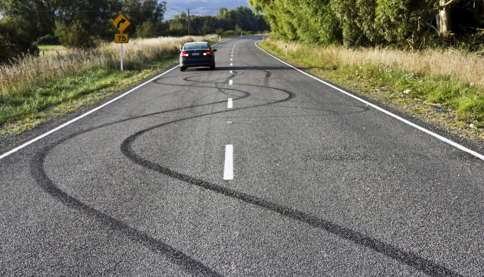 Skidmarks on country road