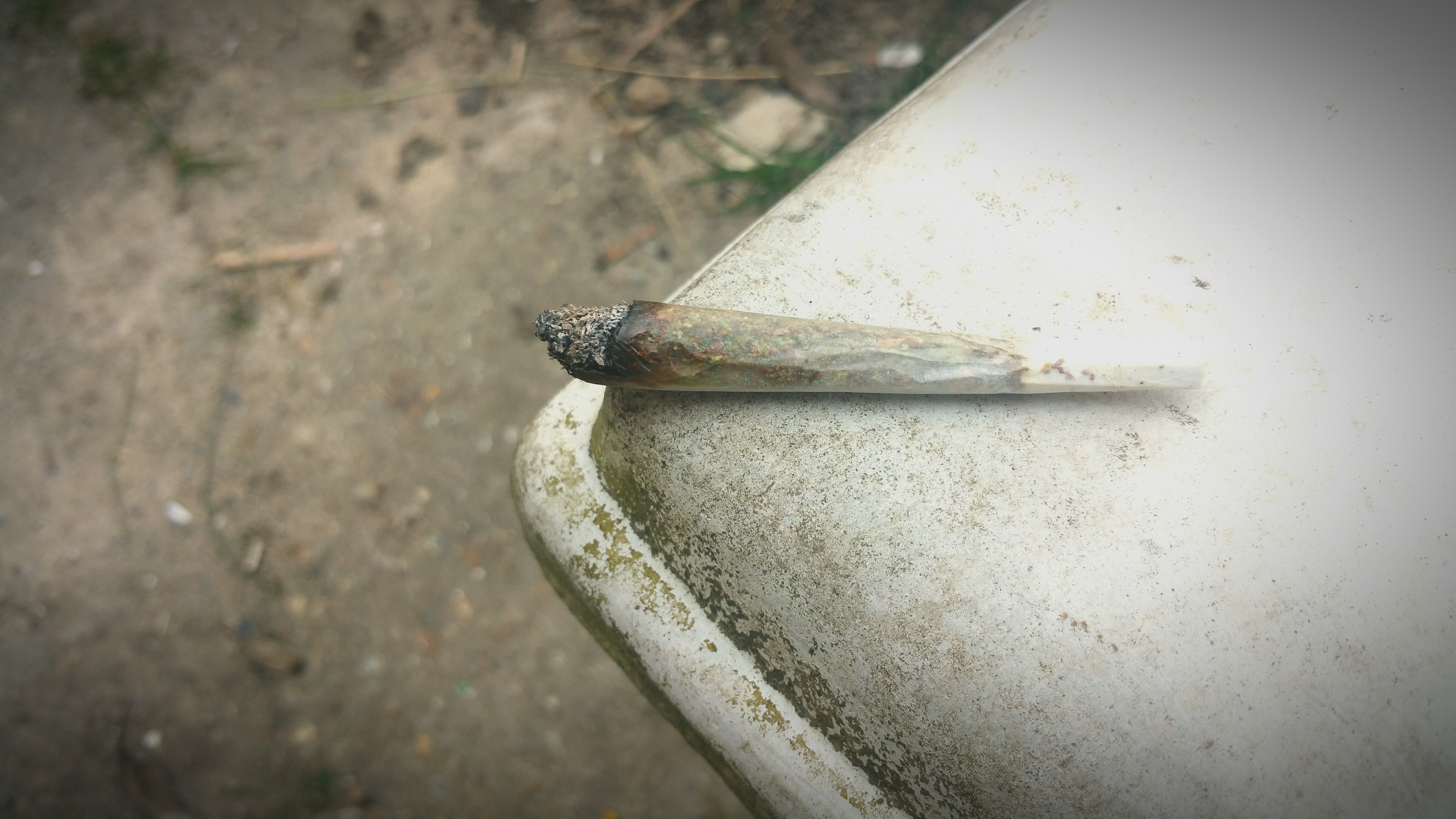 High Angle View Of Marijuana Joint On Table